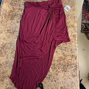 Red asymmetrical tire wrap red skirt